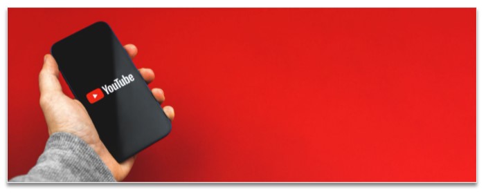 hand-holding-smartphone-with-youtube-logo-red-bg