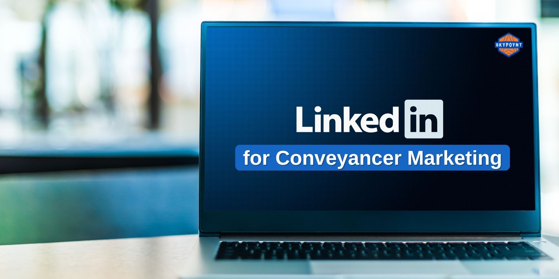 laptop with dark screen and LinkedIn logo with for conveyancer marketing text overlay 