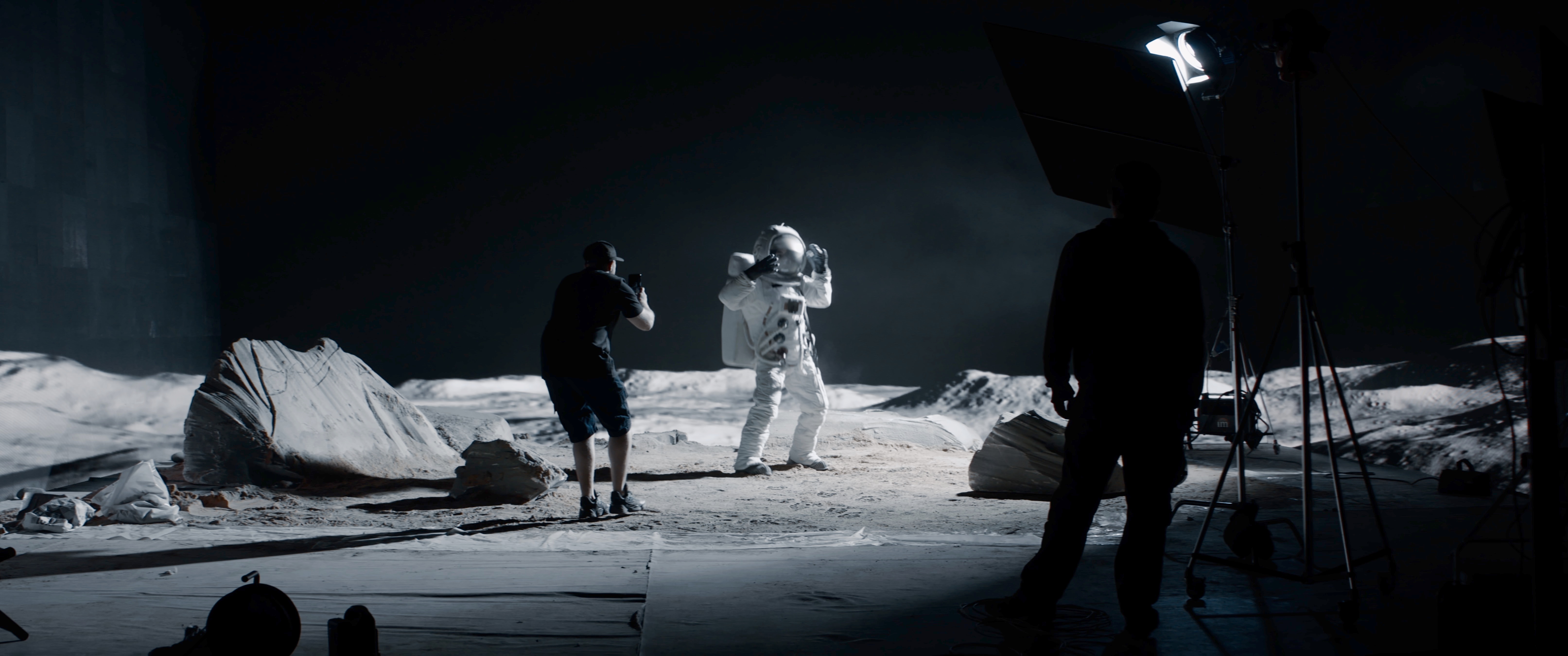 black and white image of video shoot with a mobile phone of a fake moon landing scene header image 